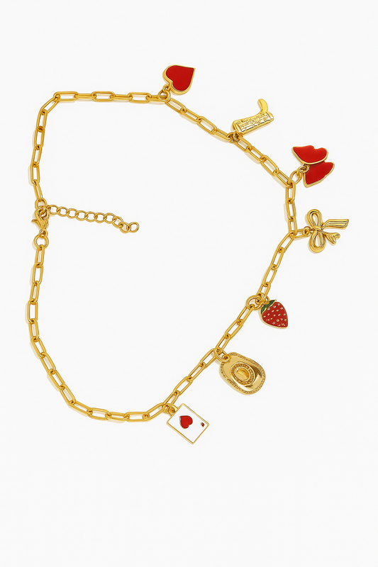 Collar dorado con dijes rojos y dorados